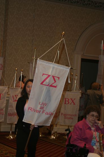 Unidentified Phi Mu With Zeta Sigma Chapter Banner in Convention Parade of Flags Photograph, July 9, 2004 (image)