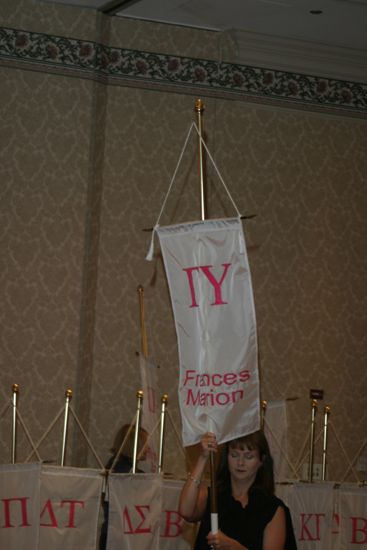 Unidentified Phi Mu With Gamma Upsilon Chapter Banner in Convention Parade of Flags Photograph, July 9, 2004 (image)