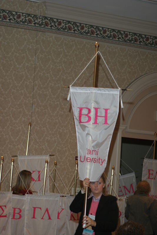 Unidentified Phi Mu With Beta Eta Chapter Banner in Convention Parade of Flags Photograph, July 9, 2004 (Image)