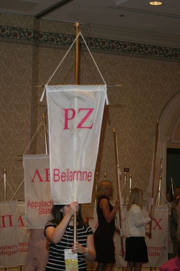 Unidentified Phi Mu With Rho Zeta Chapter Banner in Convention Parade of Flags Photograph, July 9, 2004 (image)