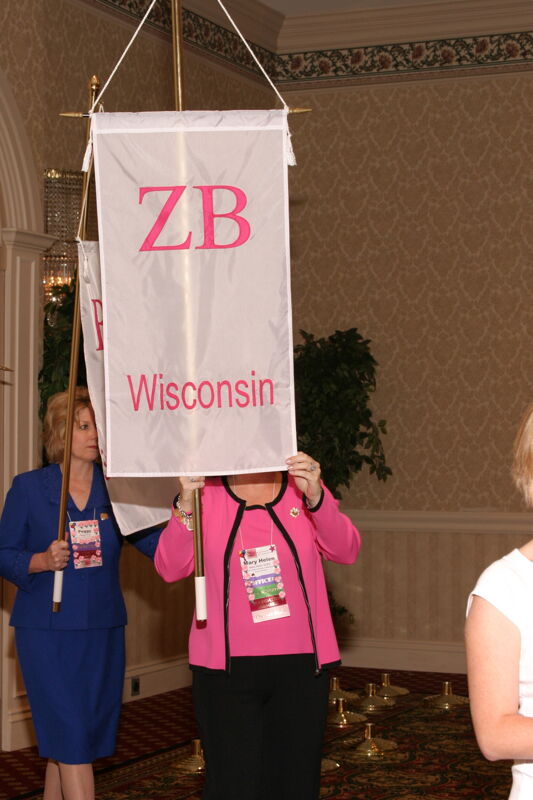Mary Helen Griffis With Zeta Beta Chapter Banner in Convention Parade of Flags Photograph, July 9, 2004 (Image)