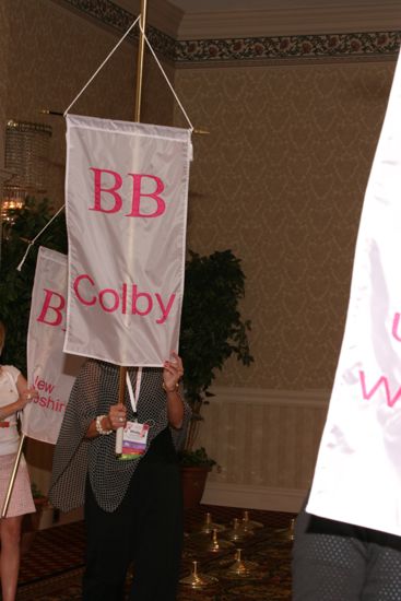 Misty Smith With Beta Beta Chapter Banner in Convention Parade of Flags Photograph, July 9, 2004 (image)