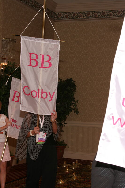 Misty Smith With Beta Beta Chapter Banner in Convention Parade of Flags Photograph, July 9, 2004 (Image)