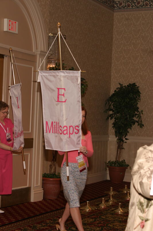 Unidentified Phi Mu With Epsilon Chapter Banner in Convention Parade of Flags Photograph, July 9, 2004 (Image)