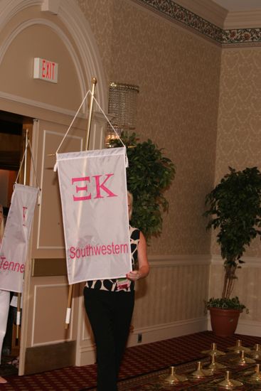 Unidentified Phi Mu With Xi Kappa Chapter Banner in Convention Parade of Flags Photograph, July 9, 2004 (image)