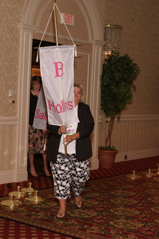 C.J. Wilson With Beta Chapter Banner in Convention Parade of Flags Photograph, July 9, 2004 (Image)