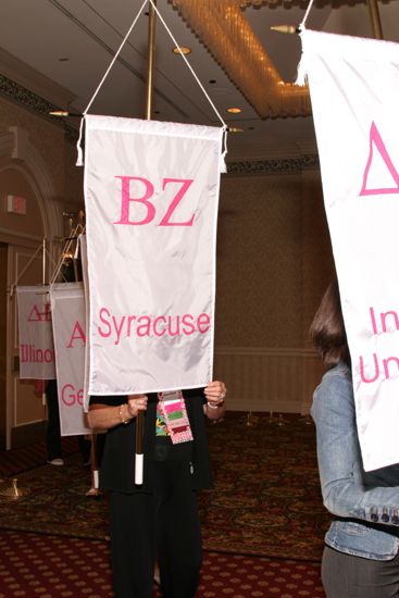 Shellye McCarty With Beta Zeta Chapter Banner in Convention Parade of Flags Photograph, July 9, 2004 (image)