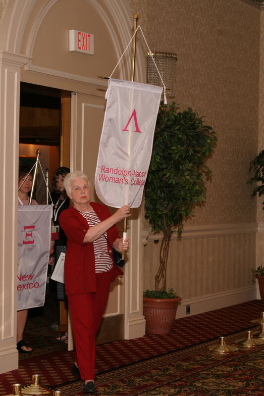 Unidentified Phi Mu With Lambda Chapter Banner in Convention Parade of Flags Photograph, July 9, 2004 (Image)