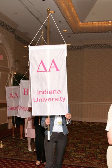 Unidentified Phi Mu With Delta Alpha Chapter Banner in Convention Parade of Flags Photograph, July 9, 2004 (image)