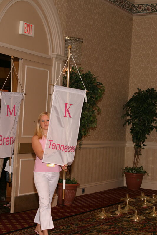 Unidentified Phi Mu With Kappa Chapter Banner in Convention Parade of Flags Photograph, July 9, 2004 (Image)