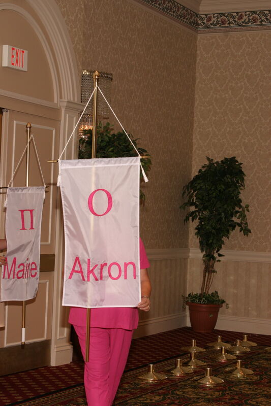 Unidentified Phi Mu With Omicron Chapter Banner in Convention Parade of Flags Photograph, July 9, 2004 (Image)