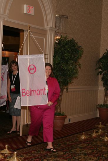 Unidentified Phi Mu With Theta Chapter Banner in Convention Parade of Flags Photograph, July 9, 2004 (image)