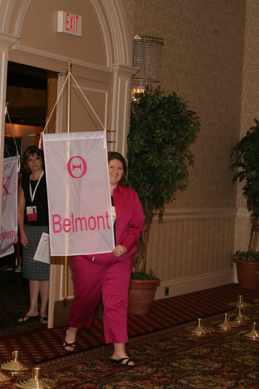 Unidentified Phi Mu With Theta Chapter Banner in Convention Parade of Flags Photograph, July 9, 2004 (Image)