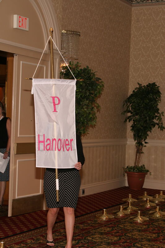 Unidentified Phi Mu With Rho Chapter Banner in Convention Parade of Flags Photograph, July 9, 2004 (Image)