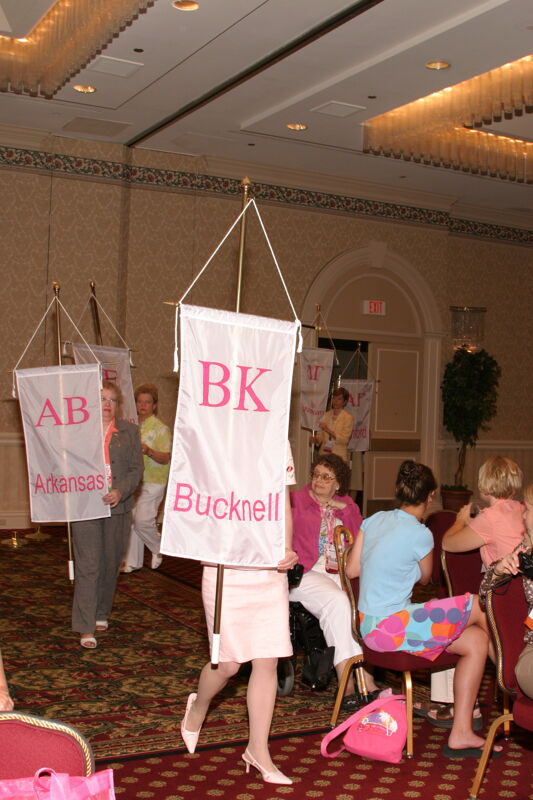 Unidentified Phi Mu With Beta Kappa Chapter Banner in Convention Parade of Flags Photograph, July 9, 2004 (Image)