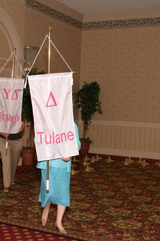 Unidentified Phi Mu With Delta Chapter Banner in Convention Parade of Flags Photograph, July 9, 2004 (Image)