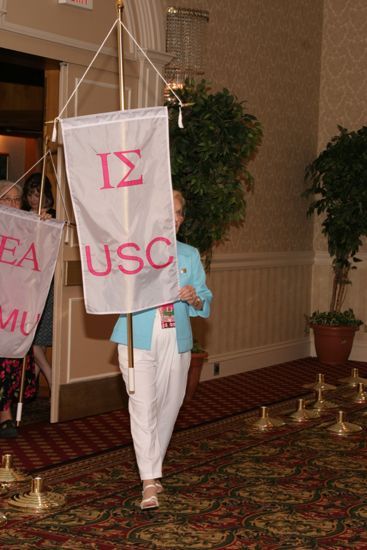 Unidentified Phi Mu With Iota Sigma Chapter Banner in Convention Parade of Flags Photograph, July 9, 2004 (image)