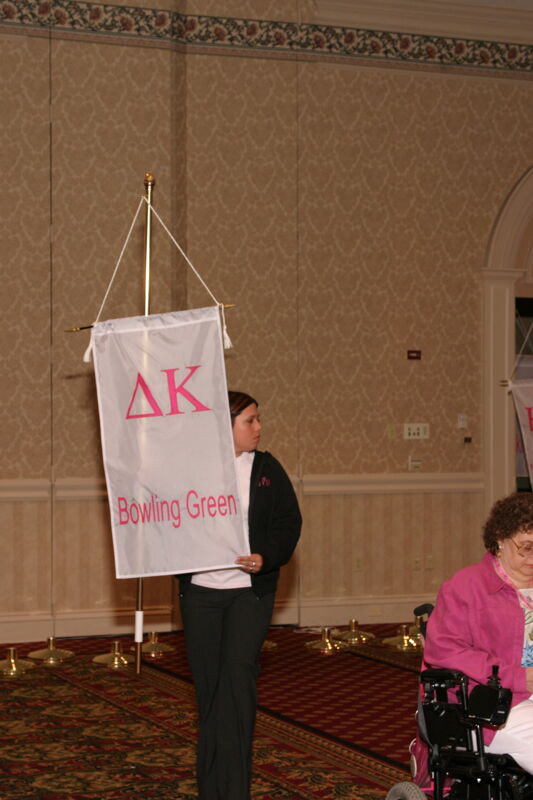 Unidentified Phi Mu With Delta Kappa Chapter Banner in Convention Parade of Flags Photograph, July 9, 2004 (Image)