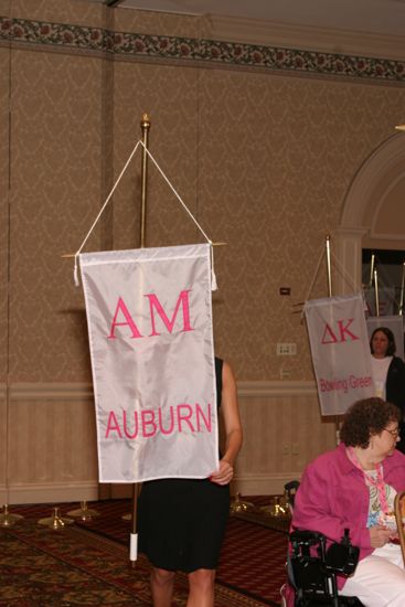 Unidentified Phi Mu With Alpha Mu Chapter Banner in Convention Parade of Flags Photograph, July 9, 2004 (image)