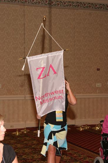 Unidentified Phi Mu With Zeta Lambda Chapter Banner in Convention Parade of Flags Photograph, July 9, 2004 (image)