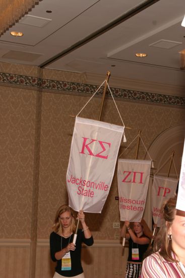 Unidentified Phi Mu With Kappa Sigma Chapter Banner in Convention Parade of Flags Photograph, July 9, 2004 (image)