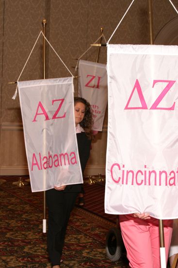 Unidentified Phi Mu With Alpha Zeta Chapter Banner in Convention Parade of Flags Photograph, July 9, 2004 (image)