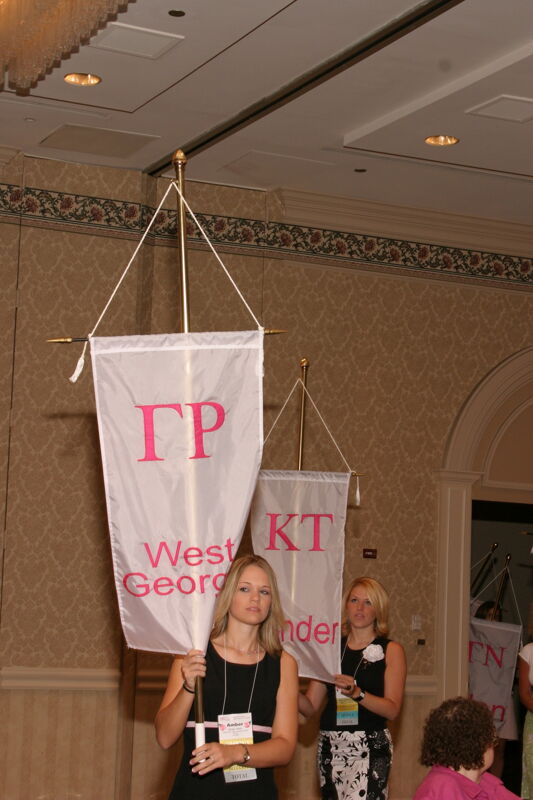 Amber Aiken With Gamma Rho Chapter Banner in Convention Parade of Flags Photograph, July 9, 2004 (Image)