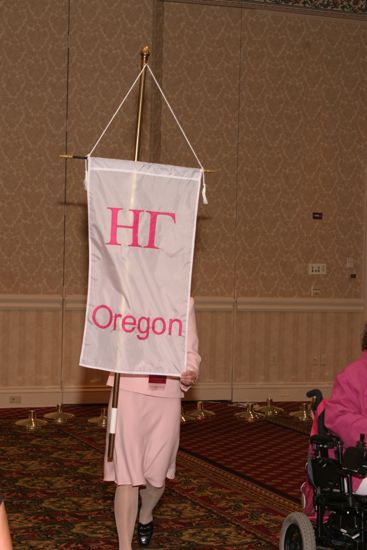 Unidentified Phi Mu With Eta Gamma Chapter Banner in Convention Parade of Flags Photograph, July 9, 2004 (image)