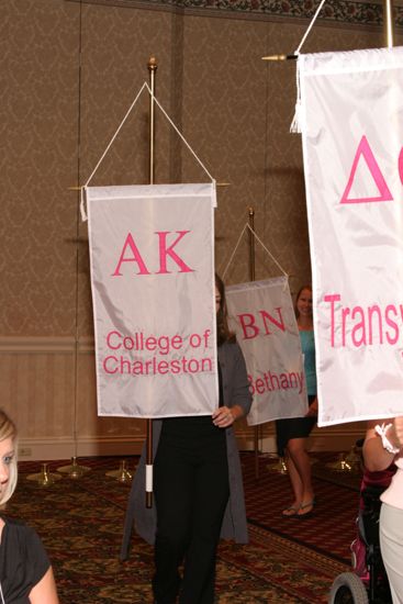 Unidentified Phi Mu With Alpha Kappa Chapter Banner in Convention Parade of Flags Photograph, July 9, 2004 (image)