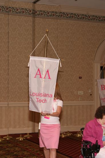 Unidentified Phi Mu With Alpha Lambda Chapter Banner in Convention Parade of Flags Photograph, July 9, 2004 (image)