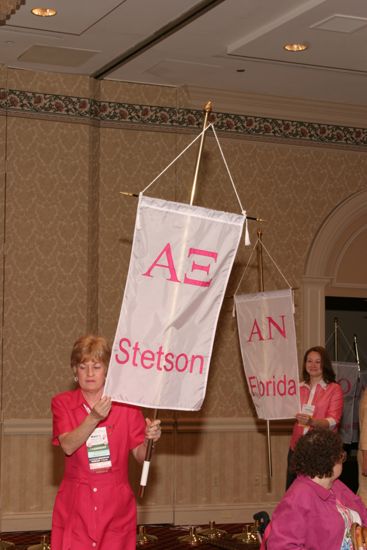 Unidentified Phi Mu With Alpha Xi Chapter Banner in Convention Parade of Flags Photograph, July 9, 2004 (image)