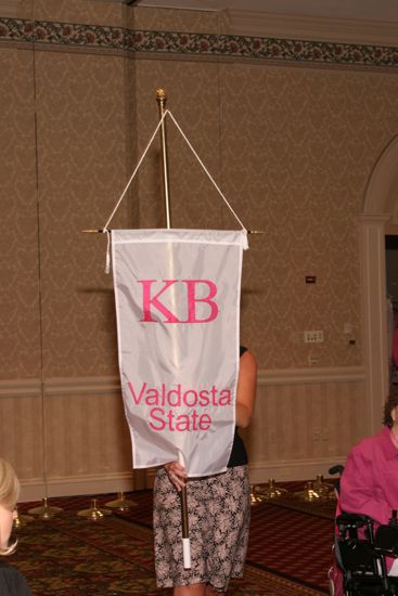 Unidentified Phi Mu With Kappa Beta Chapter Banner in Convention Parade of Flags Photograph, July 9, 2004 (image)