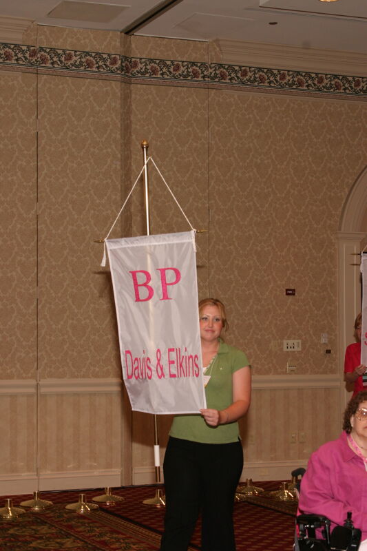 Unidentified Phi Mu With Beta Rho Chapter Banner in Convention Parade of Flags Photograph, July 9, 2004 (Image)