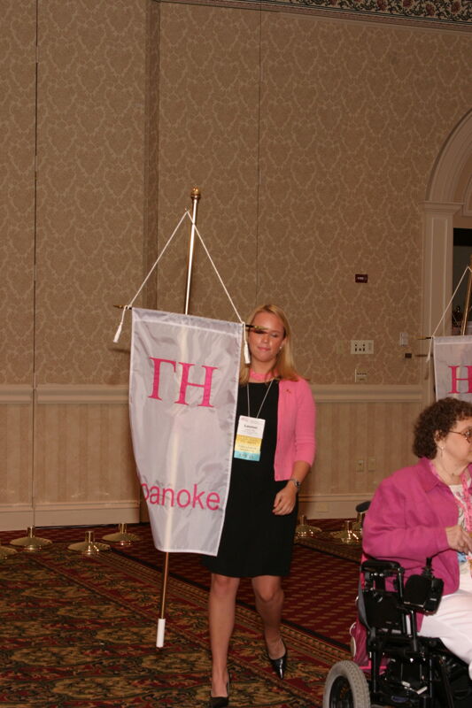 Unidentified Phi Mu With Gamma Eta Chapter Banner in Convention Parade of Flags Photograph, July 9, 2004 (Image)