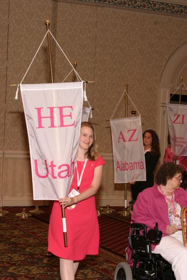 Unidentified Phi Mu With Eta Epsilon Chapter Banner in Convention Parade of Flags Photograph, July 9, 2004 (image)