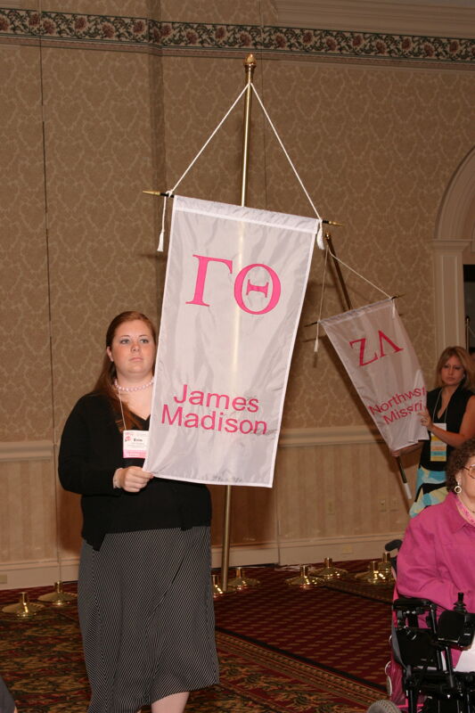 Erin Simpson With Gamma Theta Chapter Banner in Convention Parade of Flags Photograph, July 9, 2004 (Image)
