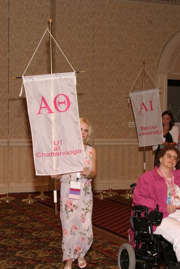 Unidentified Phi Mu With Alpha Theta Chapter Banner in Convention Parade of Flags Photograph, July 9, 2004 (image)