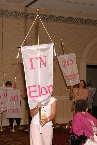 Cheryl Borden With Gamma Nu Chapter Banner in Convention Parade of Flags Photograph, July 9, 2004 (image)