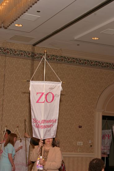 Unidentified Phi Mu With Zeta Omicron Chapter Banner in Convention Parade of Flags Photograph, July 9, 2004 (image)