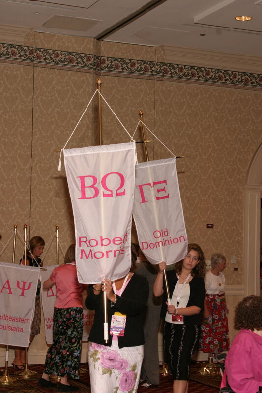 Unidentified Phi Mu With Beta Omega Chapter Banner in Convention Parade of Flags Photograph, July 9, 2004 (Image)