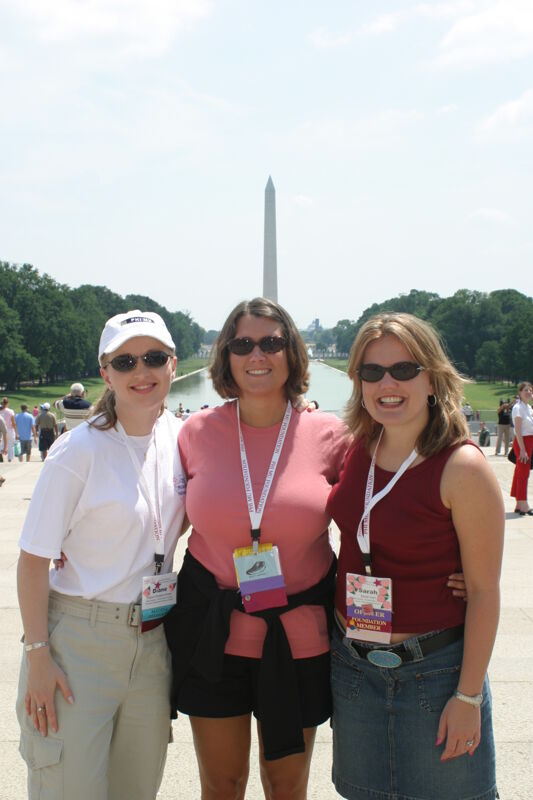 Whiddon-Brown, Unidentified, and Hall by Washington Monument During Convention Photograph, July 10, 2004 (Image)