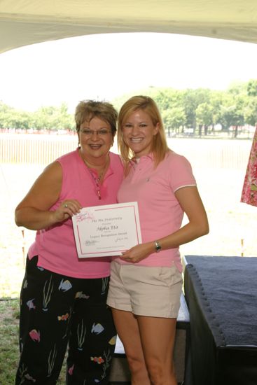 Kathy Williams and Alpha Eta Chapter Member With Certificate at Convention Outdoor Luncheon Photograph, July 10, 2004 (image)