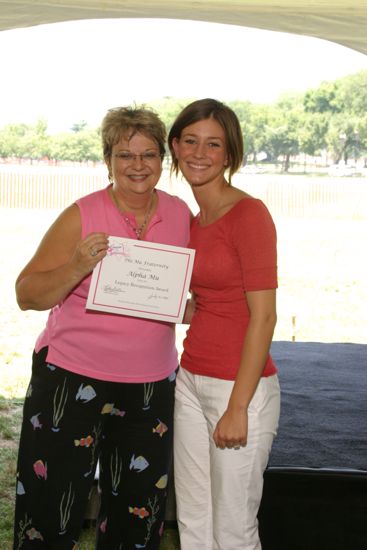 Kathy Williams and Alpha Mu Chapter Member With Certificate at Convention Outdoor Luncheon Photograph, July 10, 2004 (image)