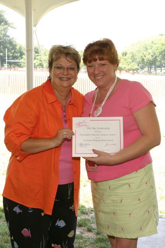 July 10 Kathy Williams and Philadelphia Alumna With Certificate at Convention Outdoor Luncheon Photograph Image