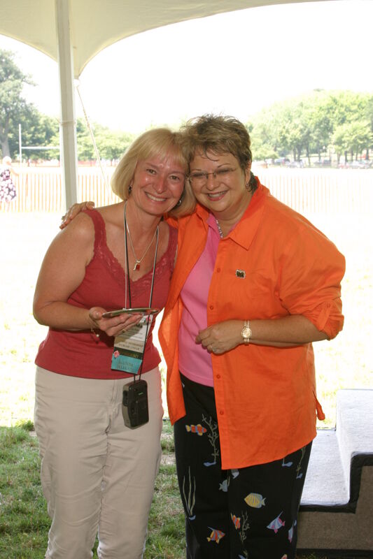 July 10 Kathy Williams and Unidentified With Award at Convention Outdoor Luncheon Photograph Image