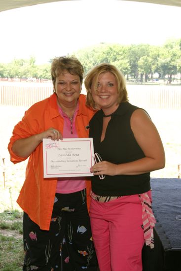 Kathy Williams and Lambda Beta Chapter Member With Certificate at Convention Outdoor Luncheon Photograph, July 10, 2004 (image)