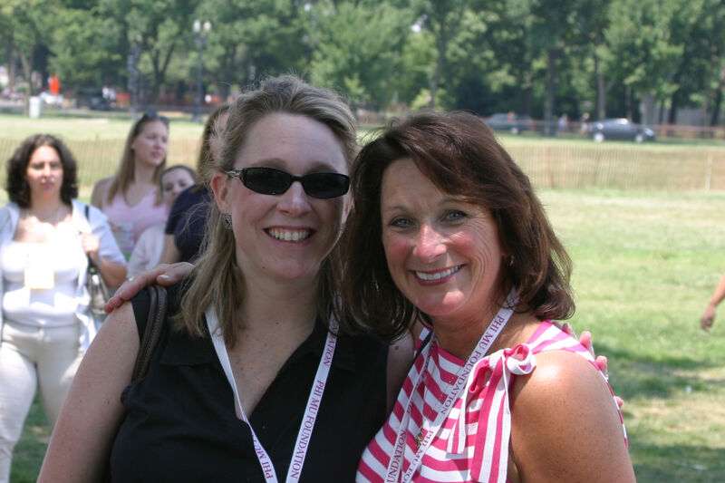 Two Unidentified Phi Mus at Convention Outdoor Luncheon Photograph 1, July 10, 2004 (Image)