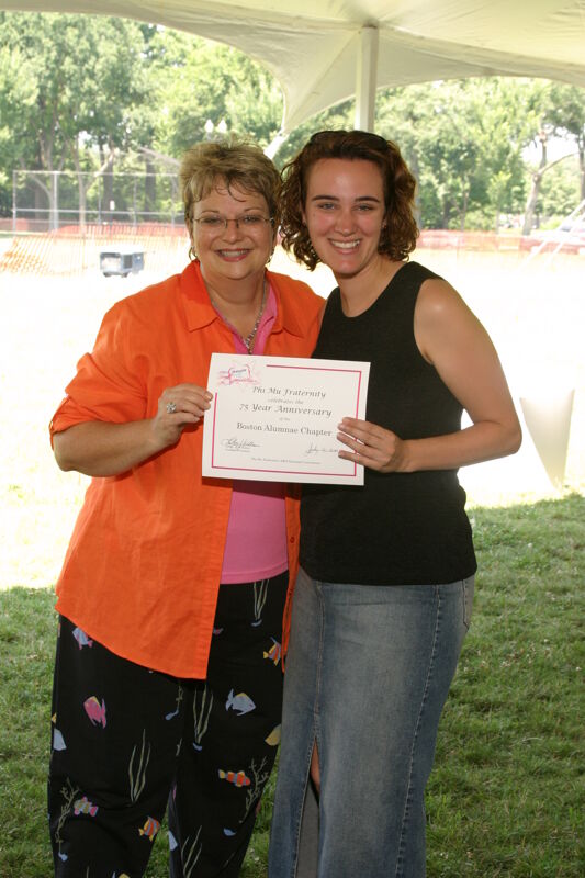 July 10 Kathy Williams and Boston Alumna With Certificate at Convention Outdoor Luncheon Photograph Image