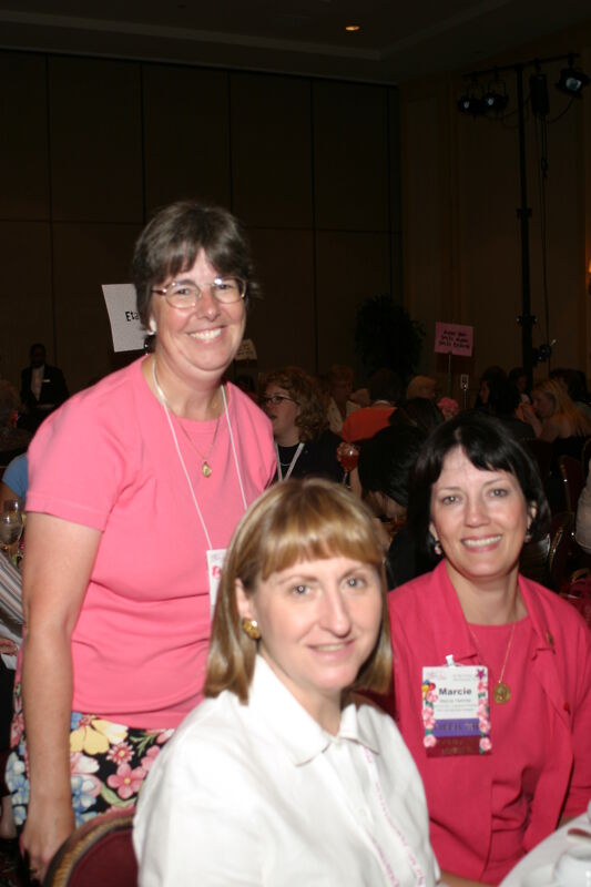 Marcie Helmke and Two Unidentified Phi Mus at Convention Photograph, July 8-11, 2004 (Image)