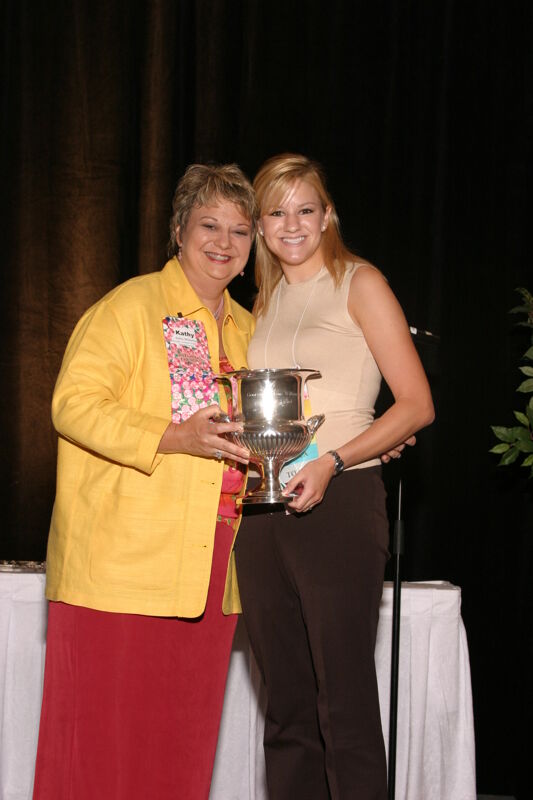 Kathy Williams and Unidentified With Award at Convention Sisterhood Luncheon Photograph 2, July 8-11, 2004 (Image)